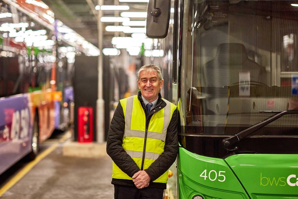 Fleet operator at Cardiff Bus depot with his electric bus fleet