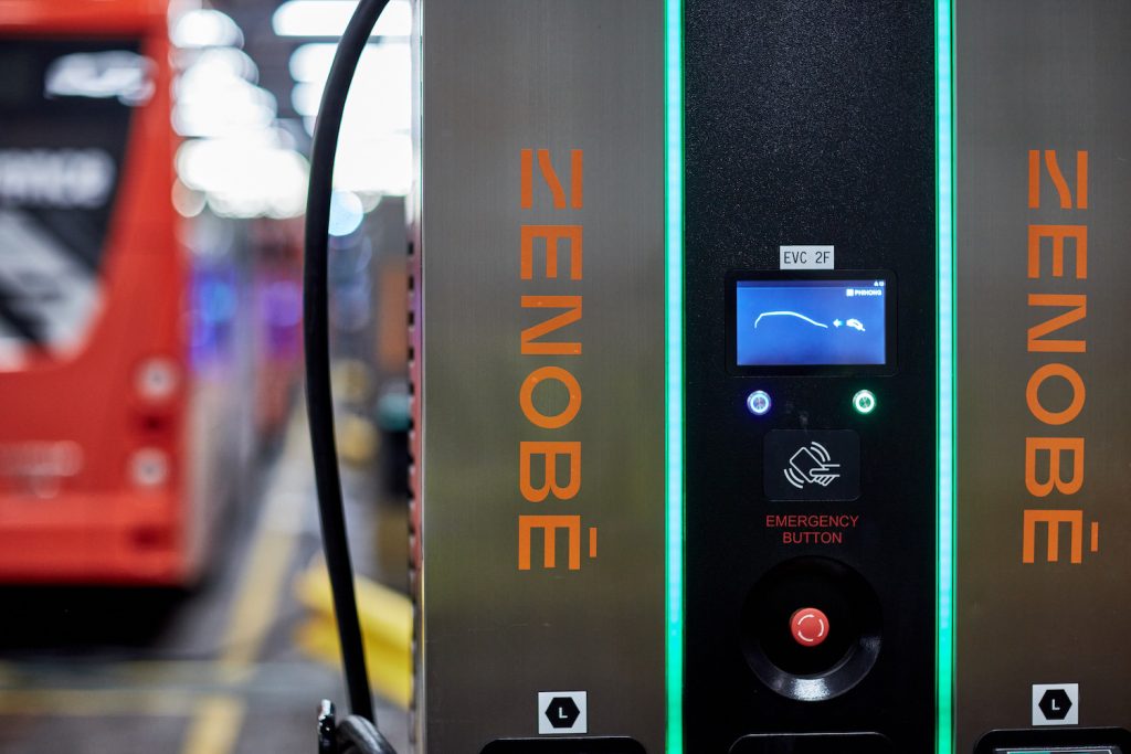 Zenobe branded electric bus charger in a bus depot