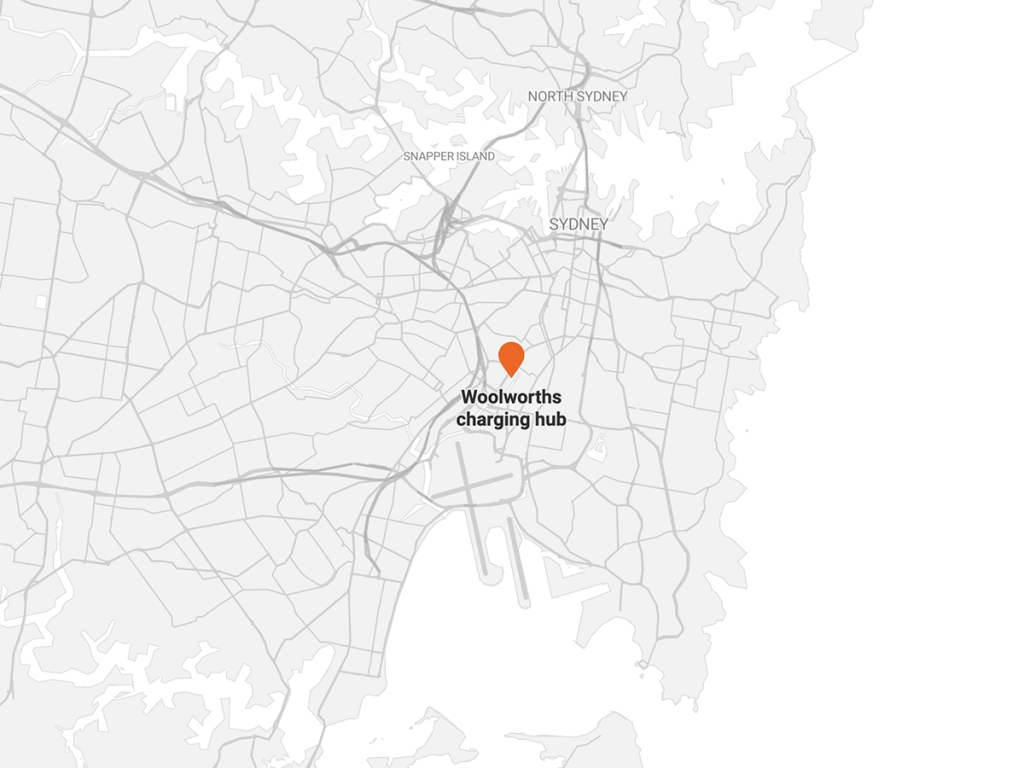 Map of Sydney, Australia, highlighting the location of the Woolworths charging hub with an orange marker near the Mascot area.