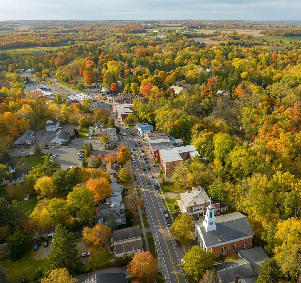 Late afternoon aerial autumn image of the area surrounding the Village of Trumansburg, NY, USA